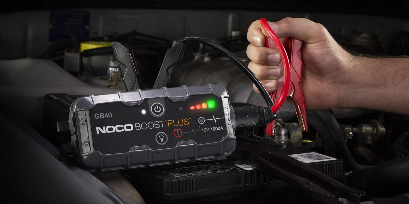 Jump Starter Boosting a Battery