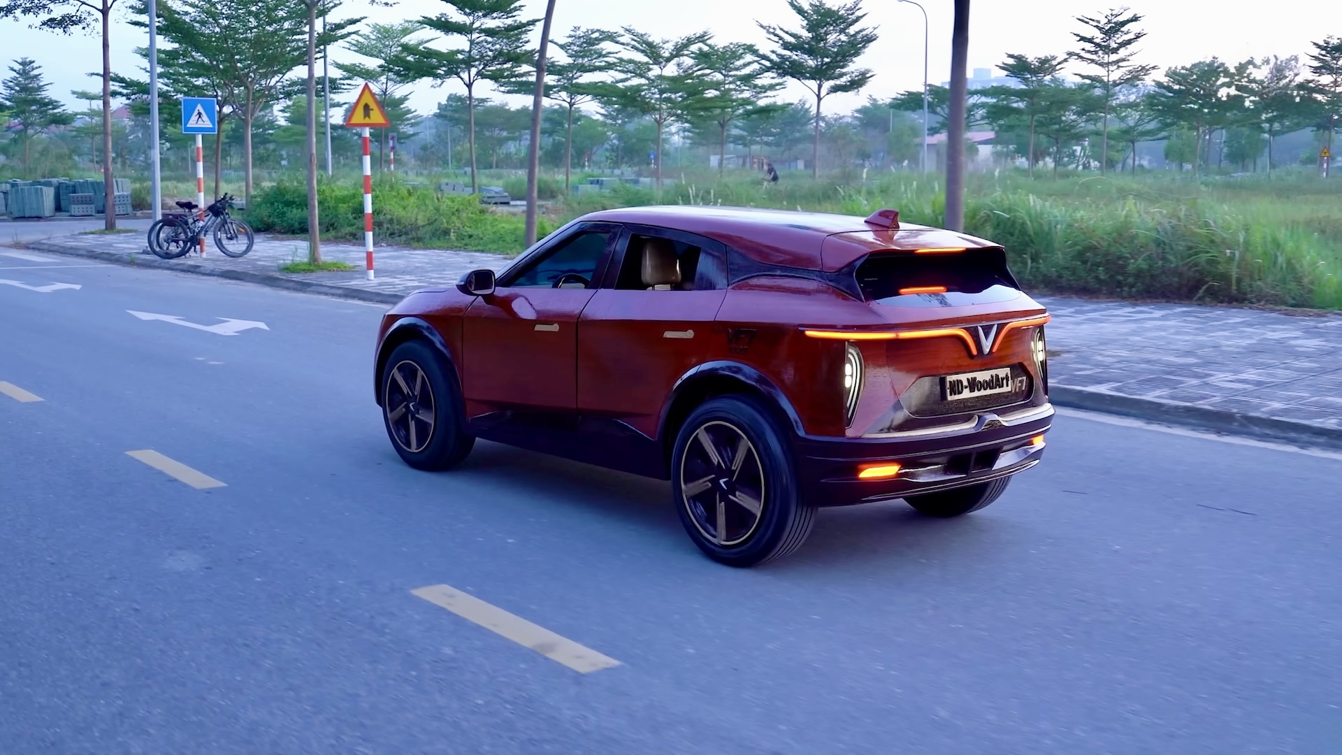Wood Carved VinFast VF7 on the Road