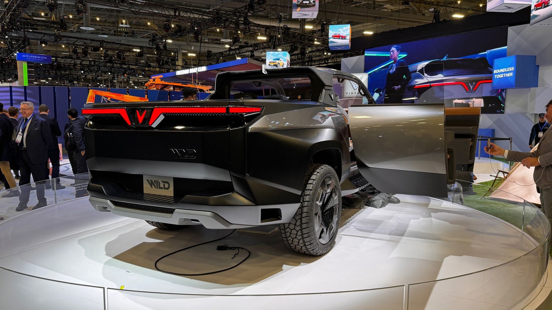 Rear view of Vinfast wild EV Pickup Truck in a showroom